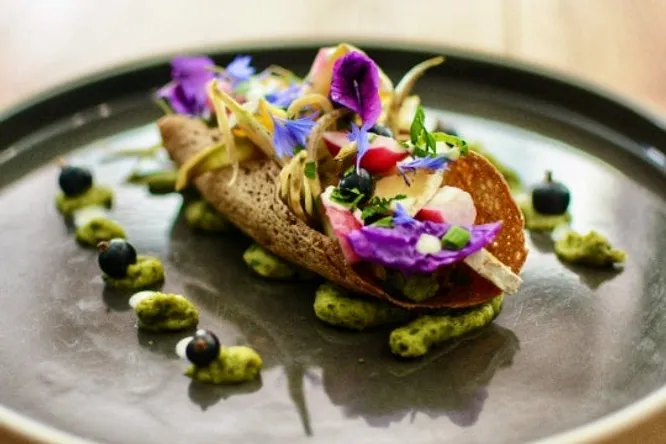Fourme cheese, broad bean and verbena tacos
