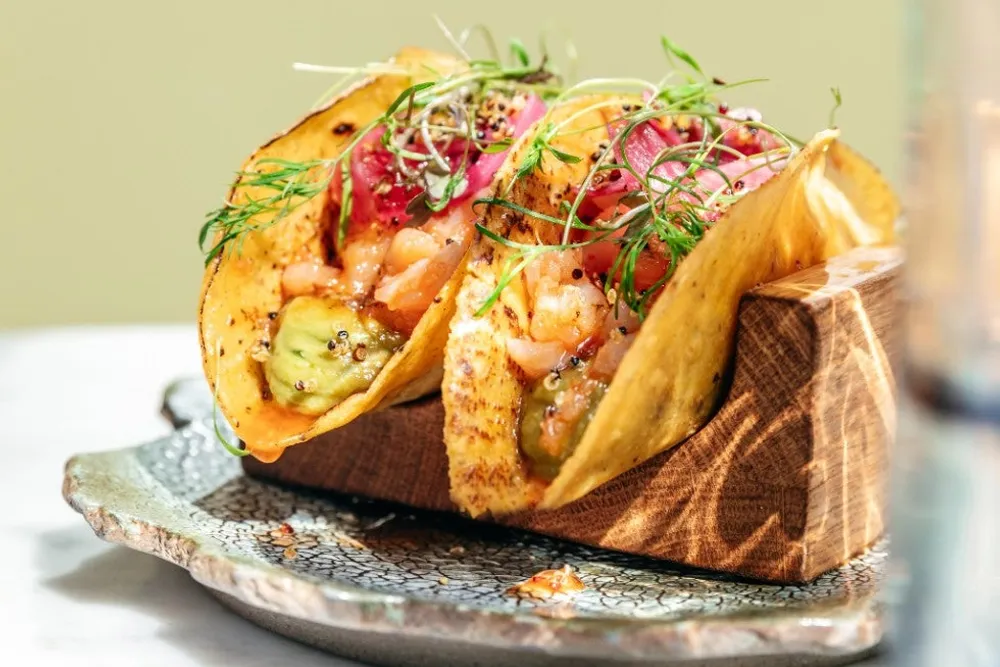 Smoked cod tacos, Nikkei guacamole & teriyaki shiso glaze